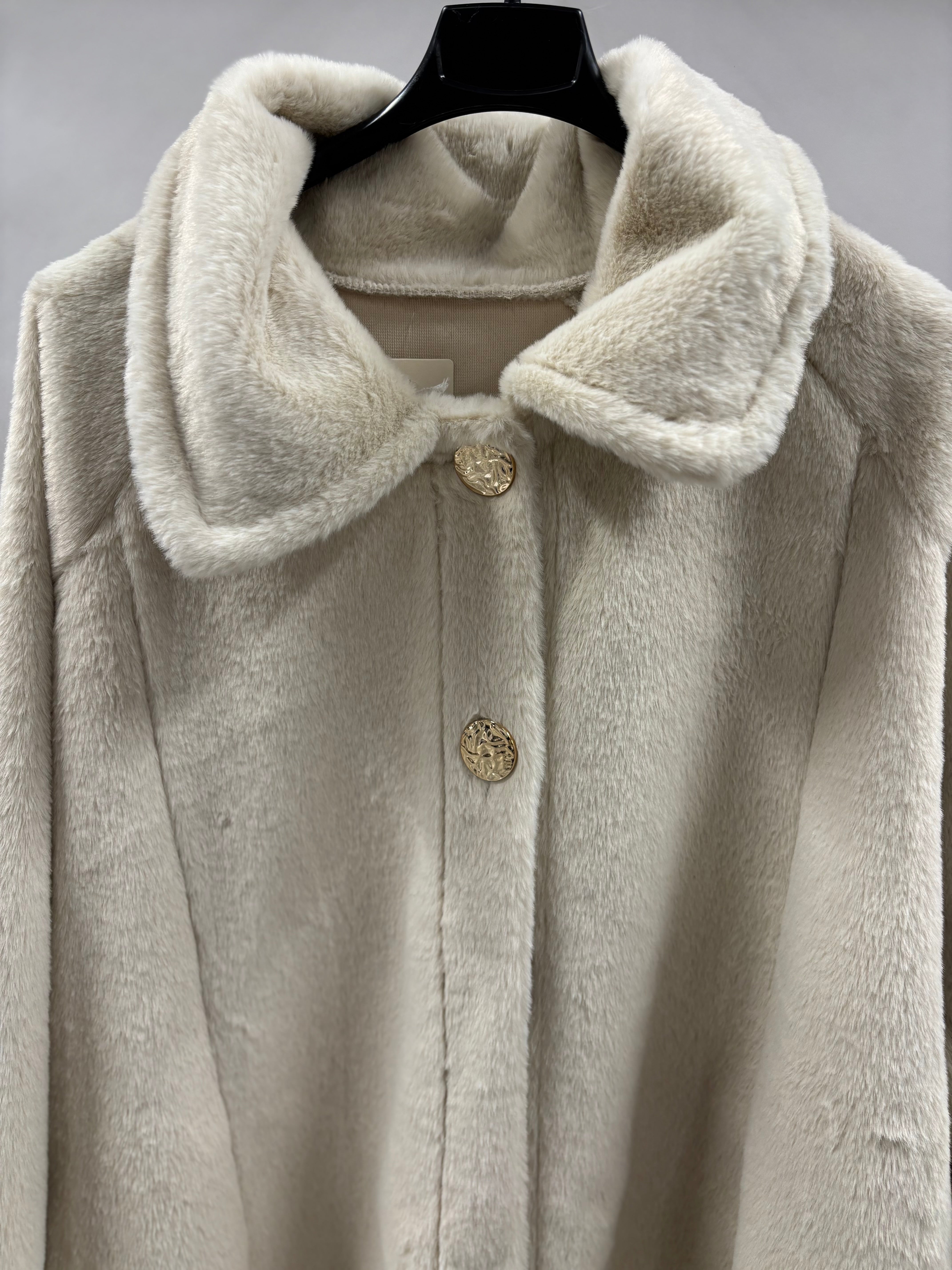 Pelsjakke, Guldknapper