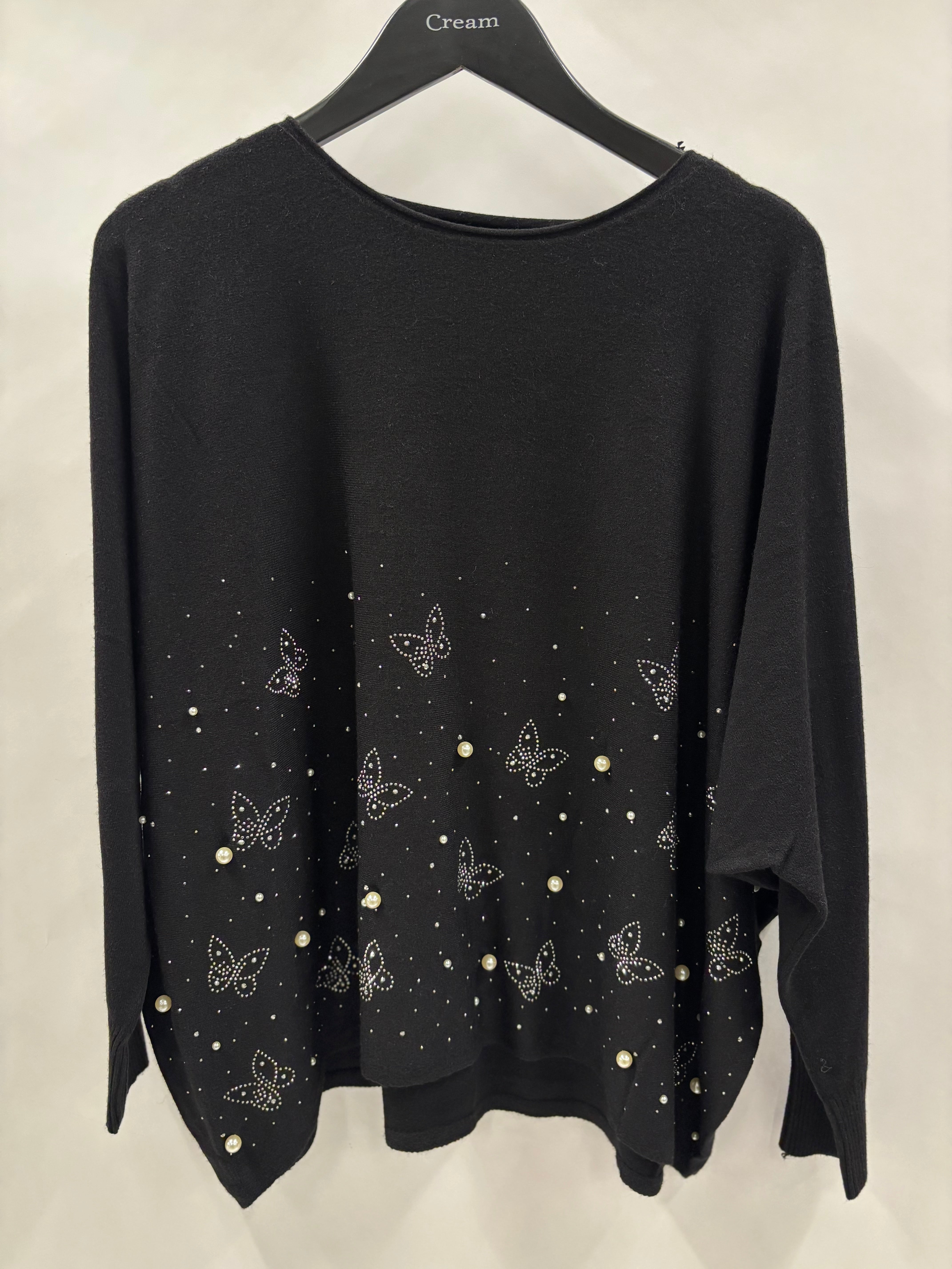 Strikbluse, Sommerfugle