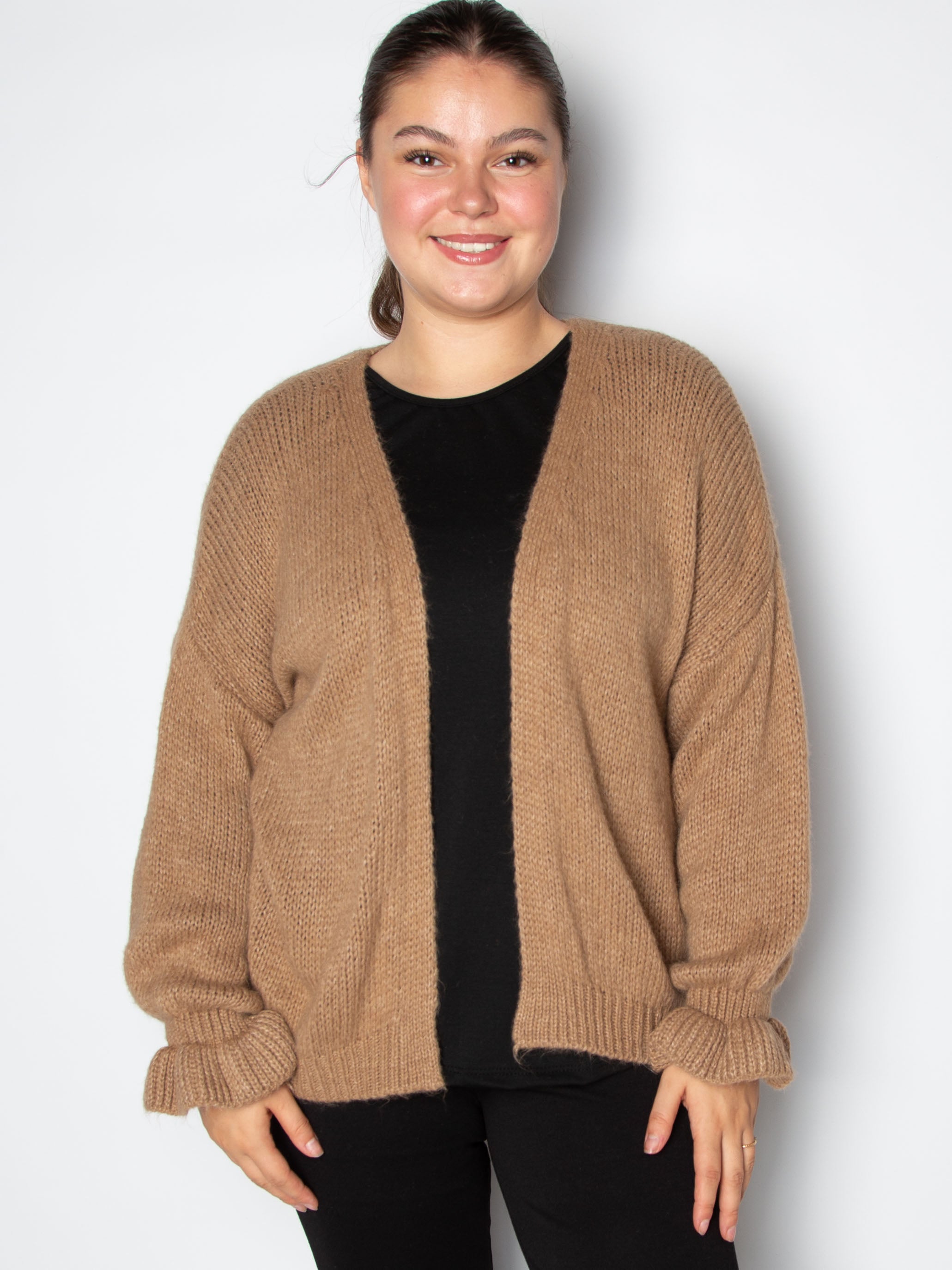 Kort cardigan med flæsekant