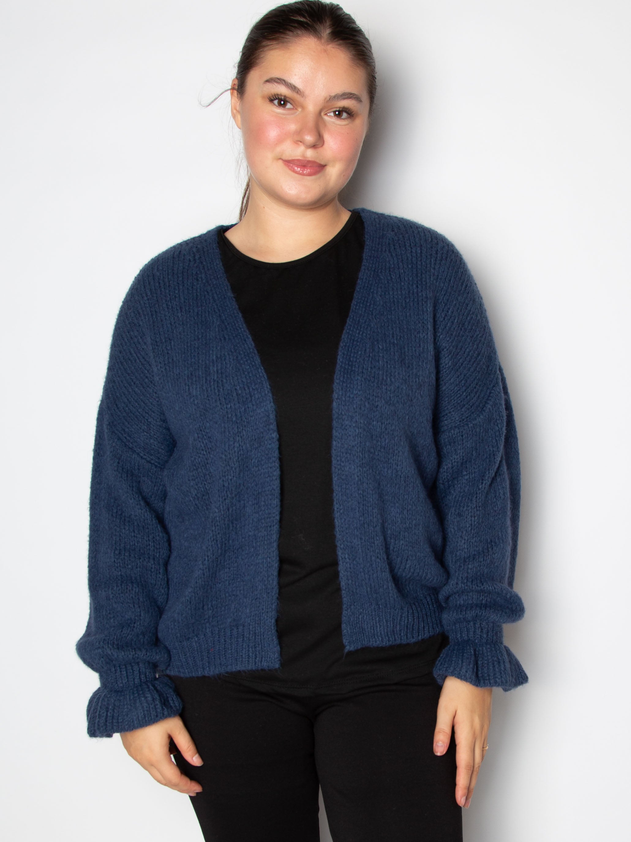 Kort cardigan med flæsekant