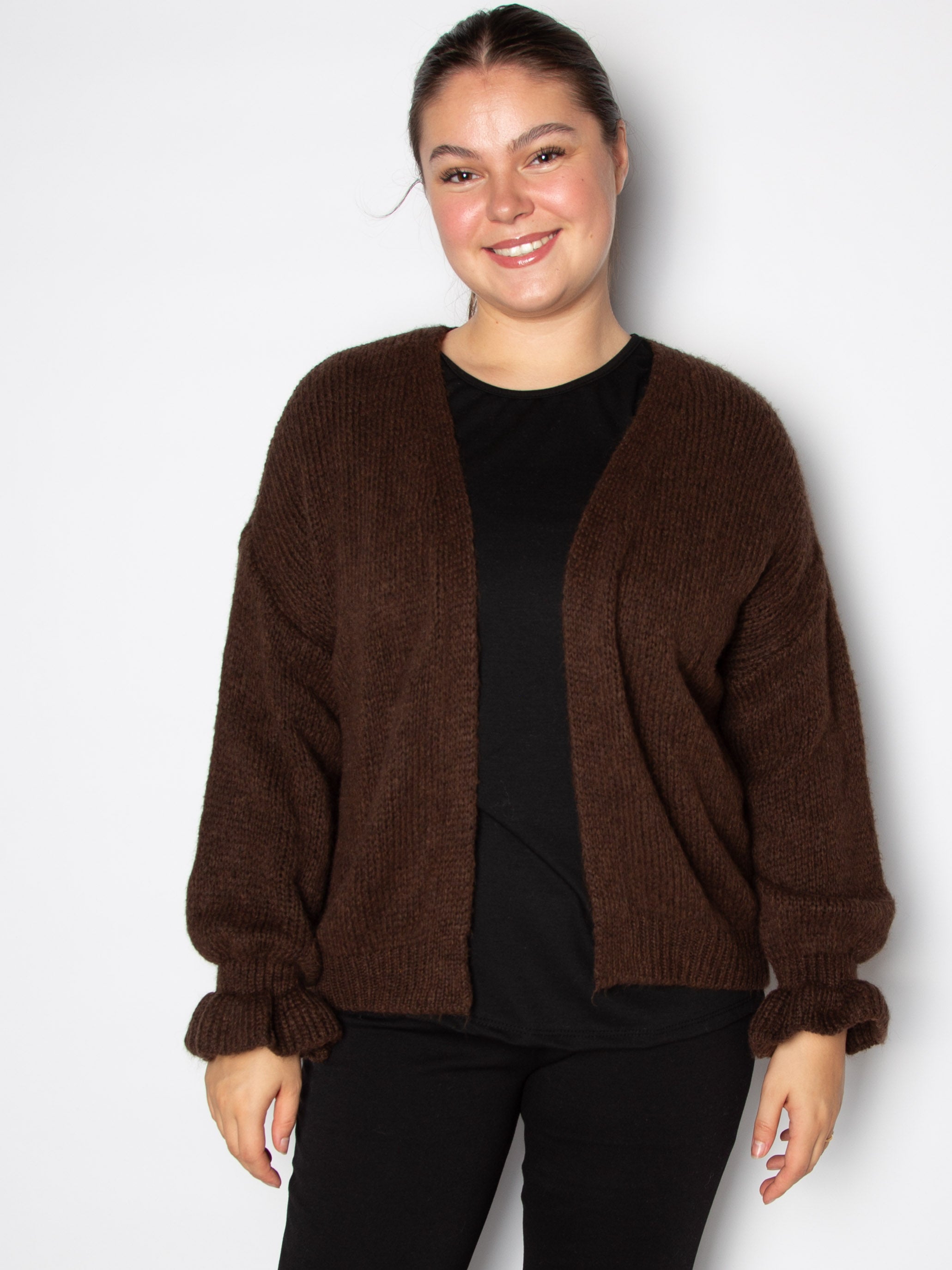 Kort cardigan med flæsekant