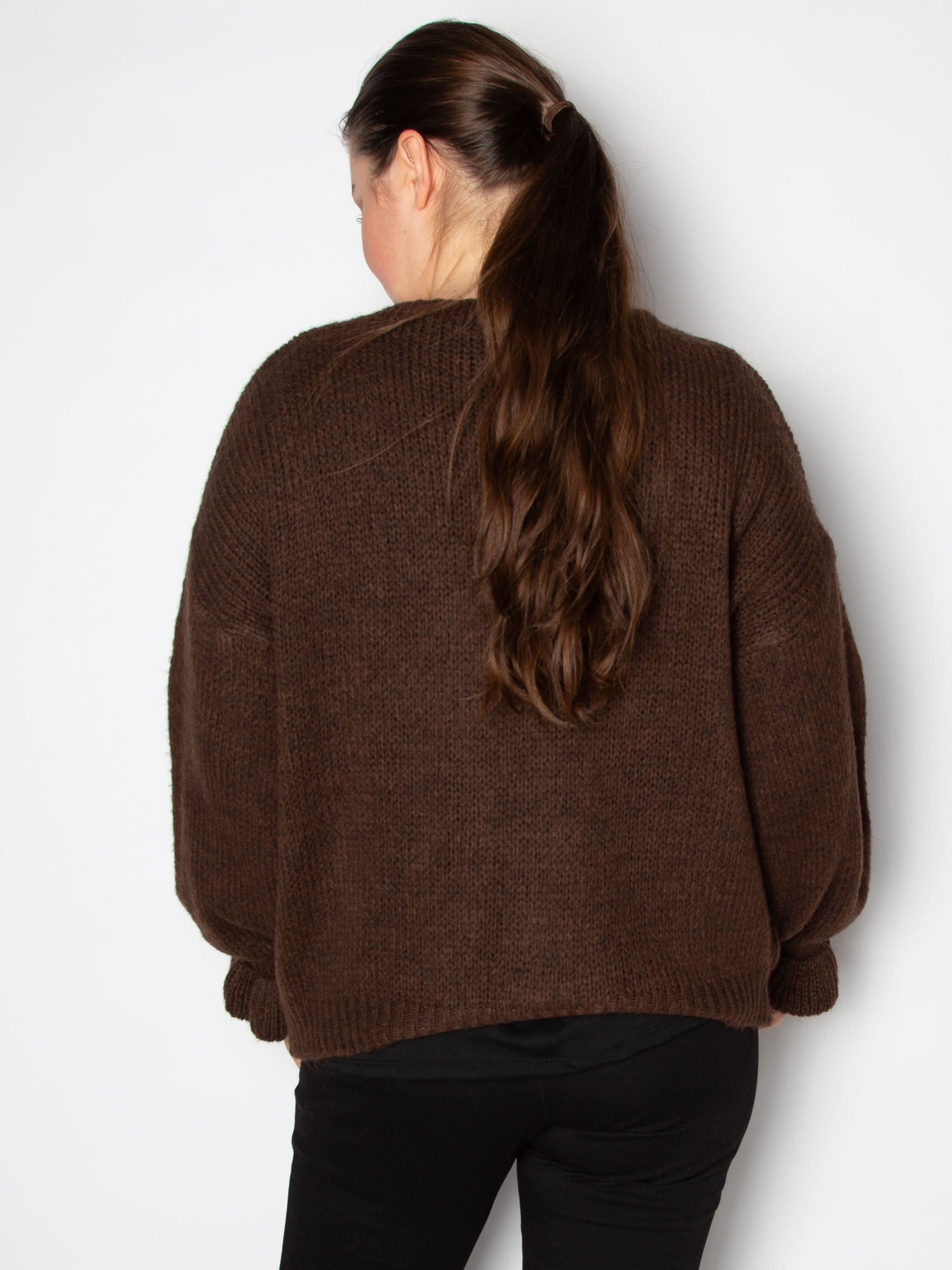 Kort cardigan med flæsekant