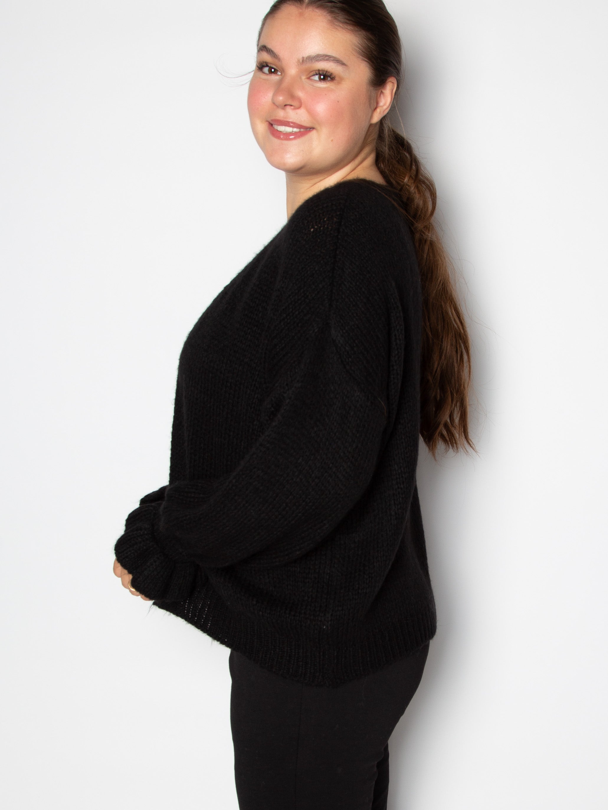 Kort cardigan med flæsekant