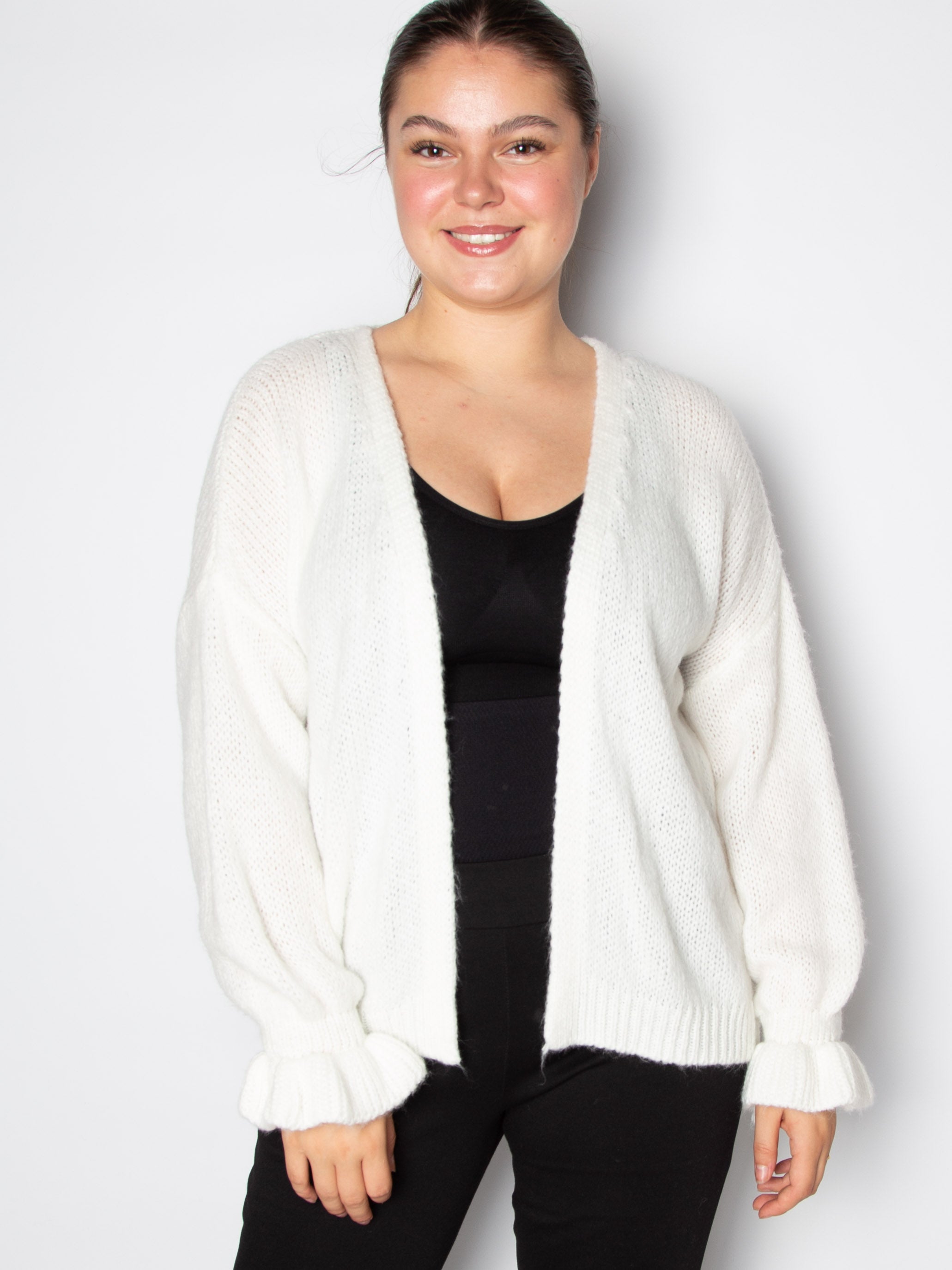Kort cardigan med flæsekant