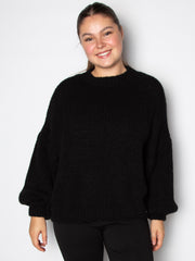 Vamset striktrøje