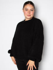 Vamset striktrøje