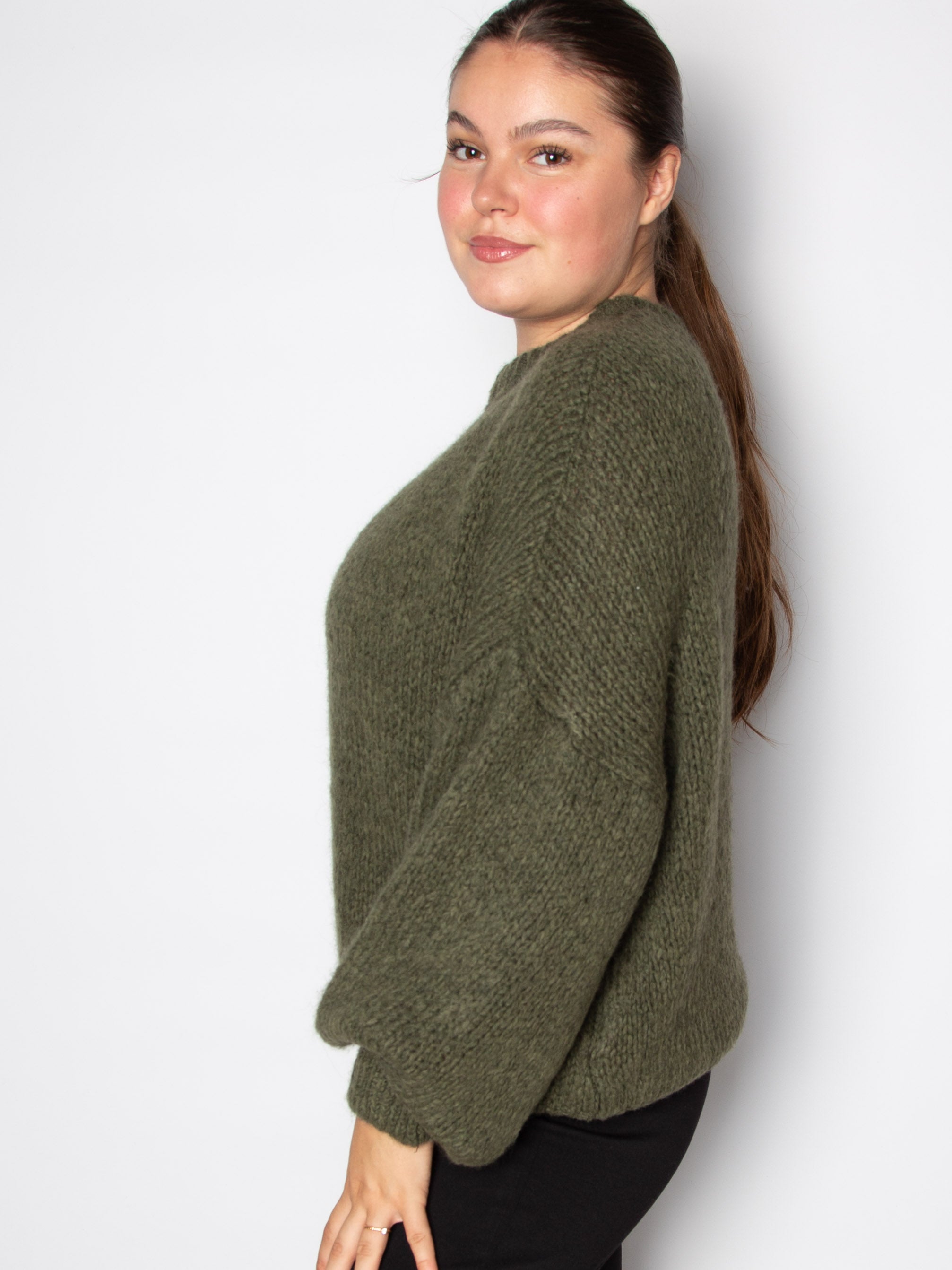 Vamset striktrøje