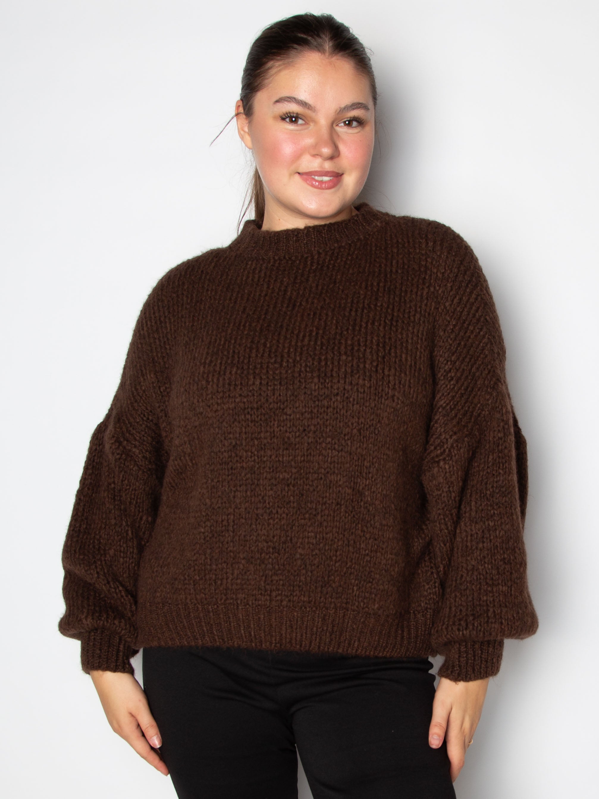 Vamset striktrøje