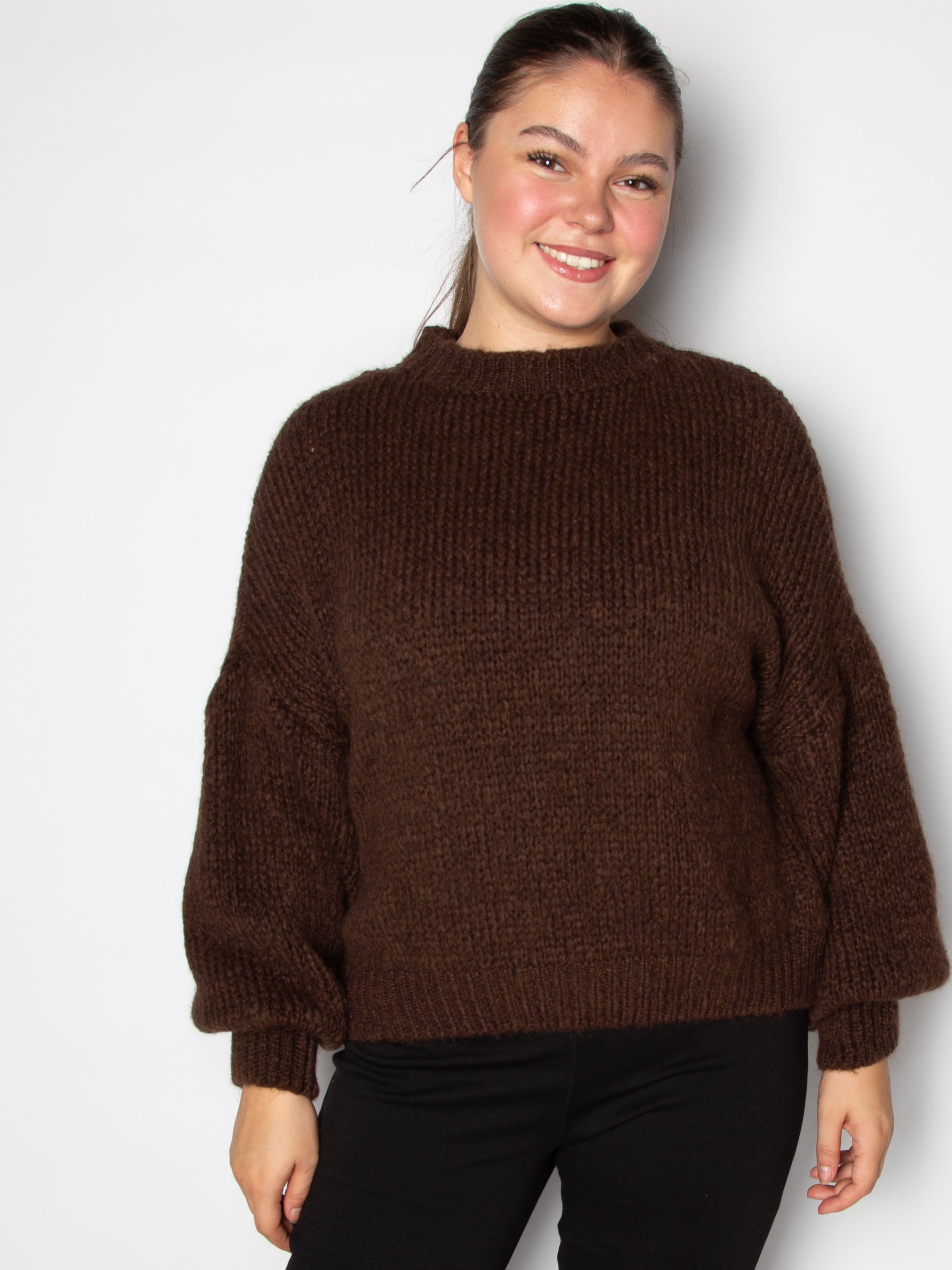 Vamset striktrøje