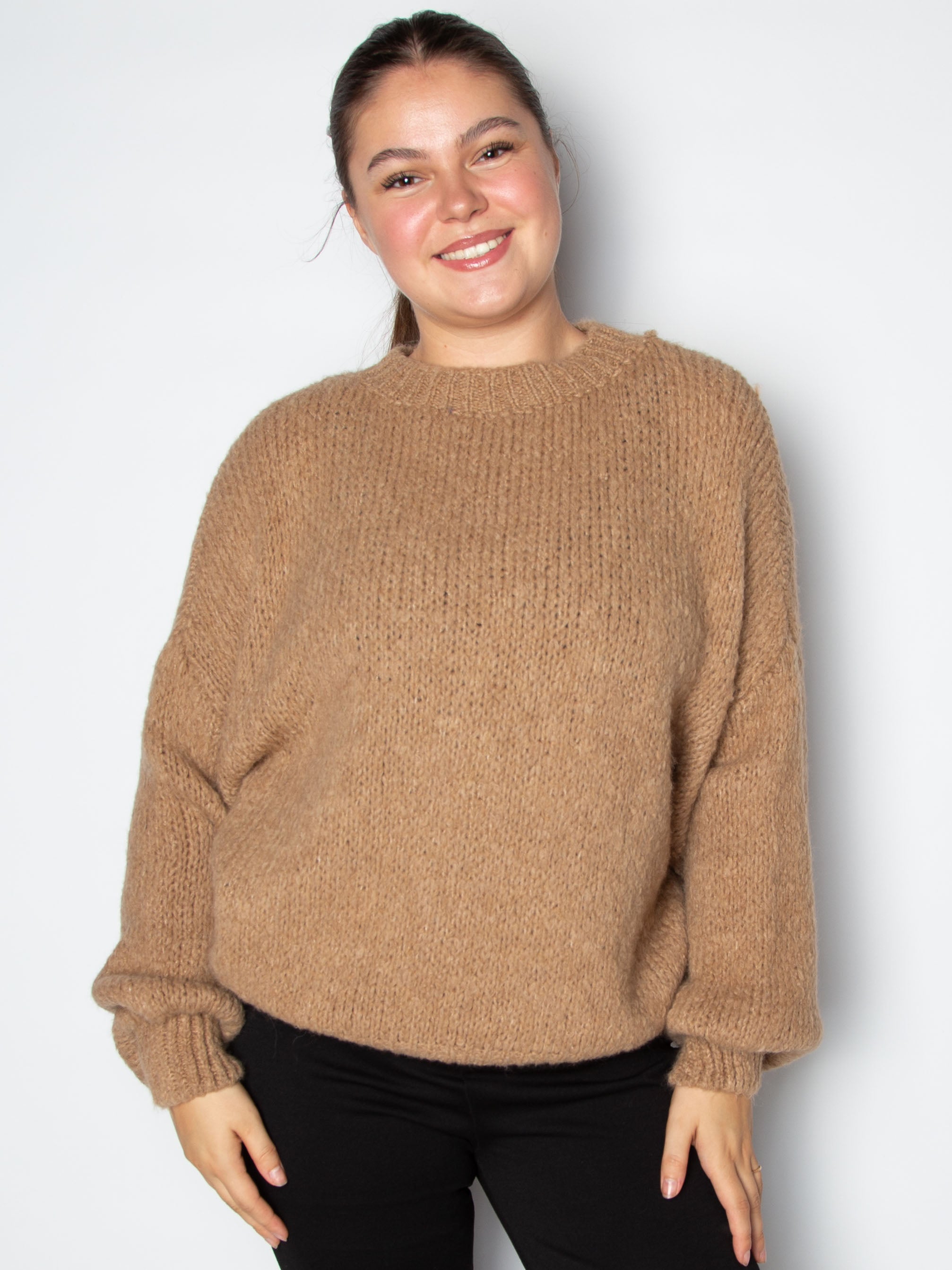 Vamset striktrøje