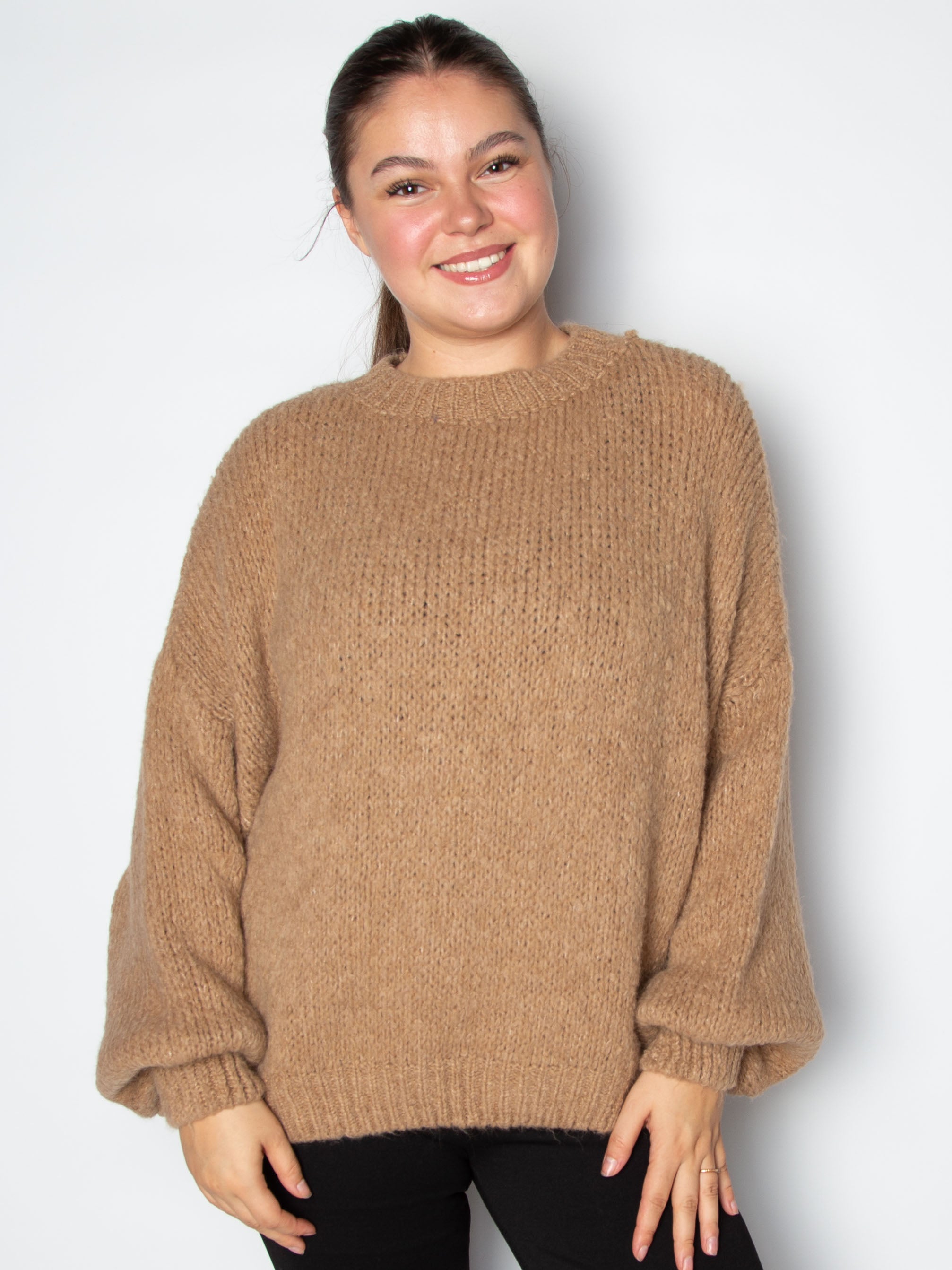 Vamset striktrøje