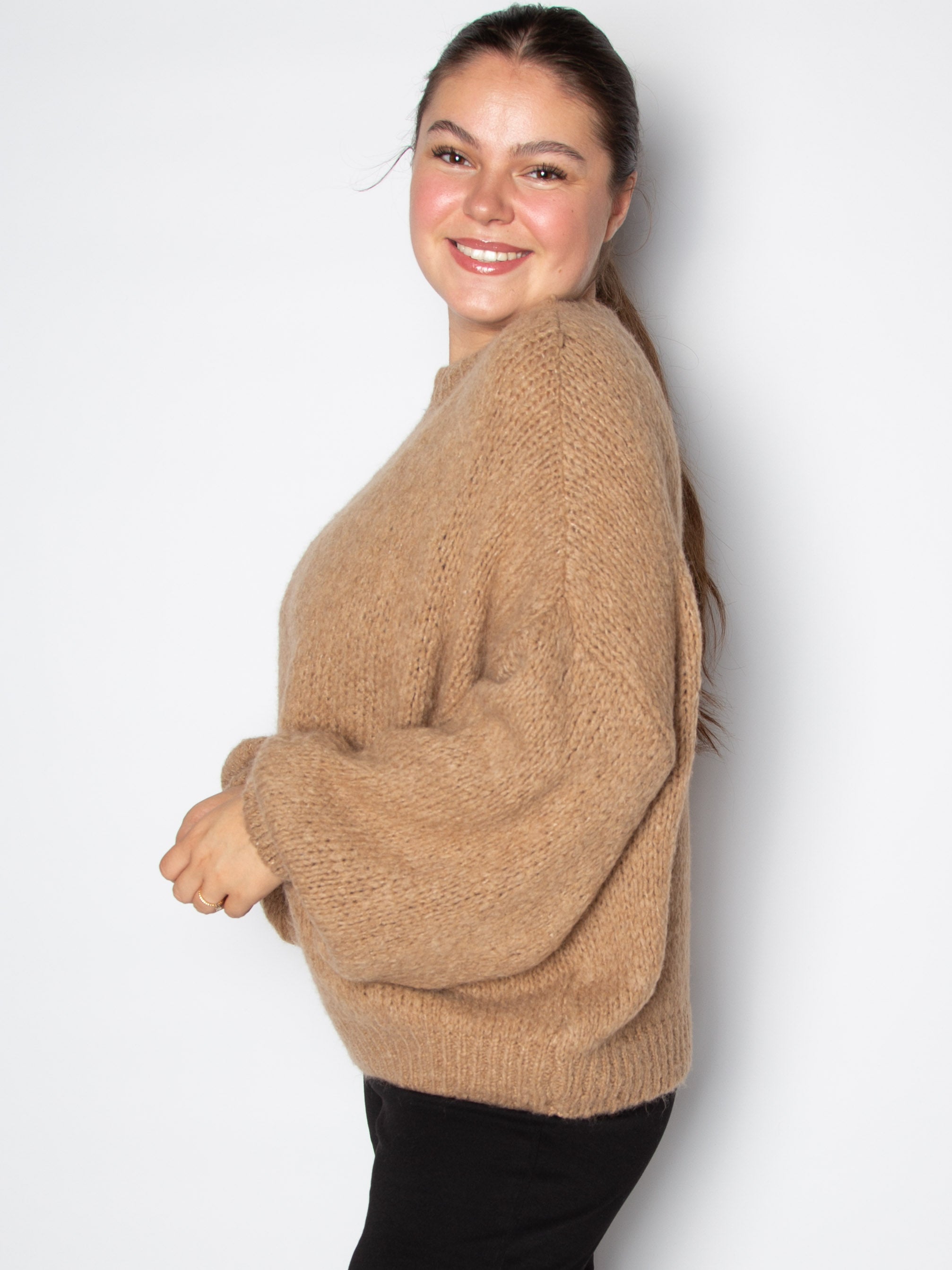 Vamset striktrøje