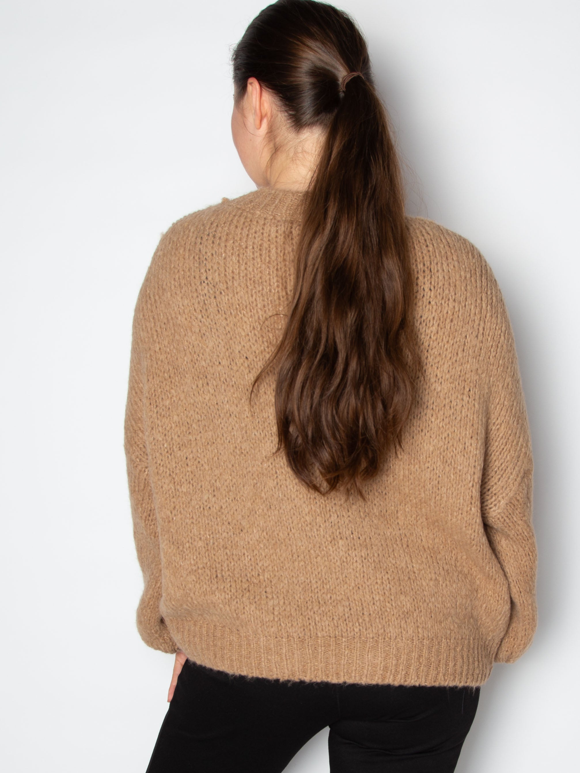 Vamset striktrøje