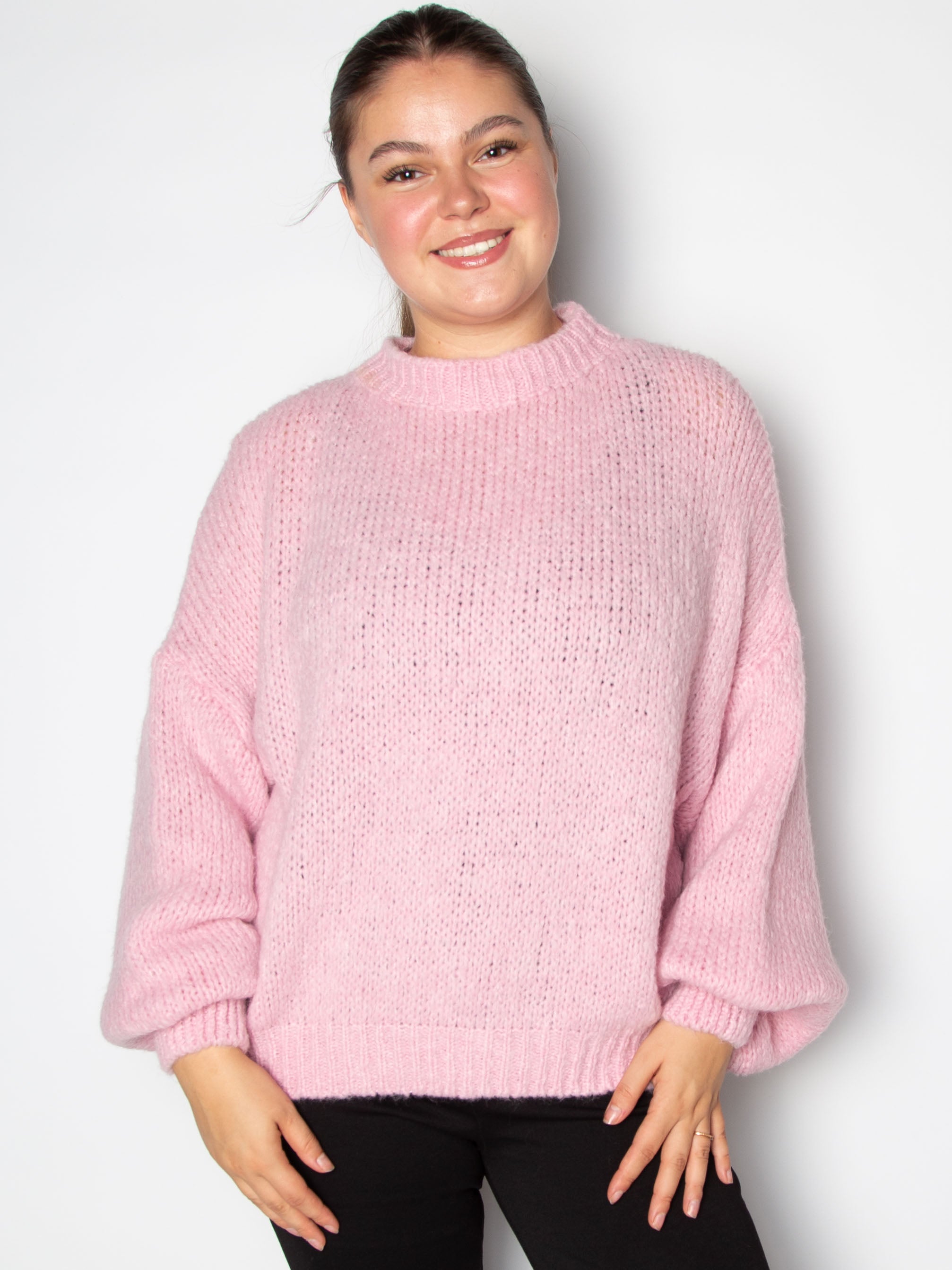 Vamset striktrøje