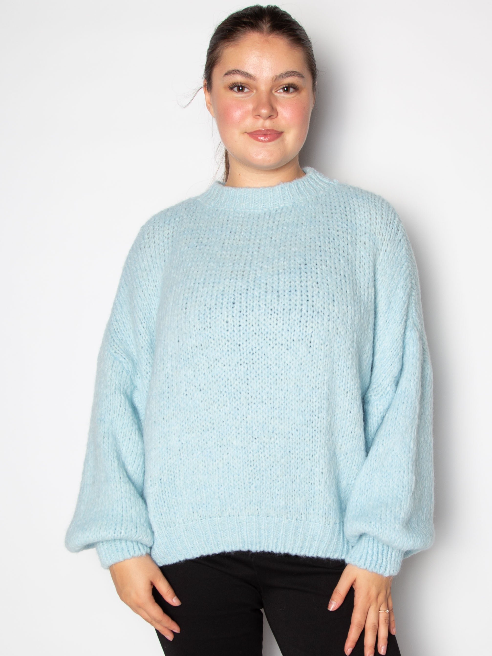 Vamset striktrøje