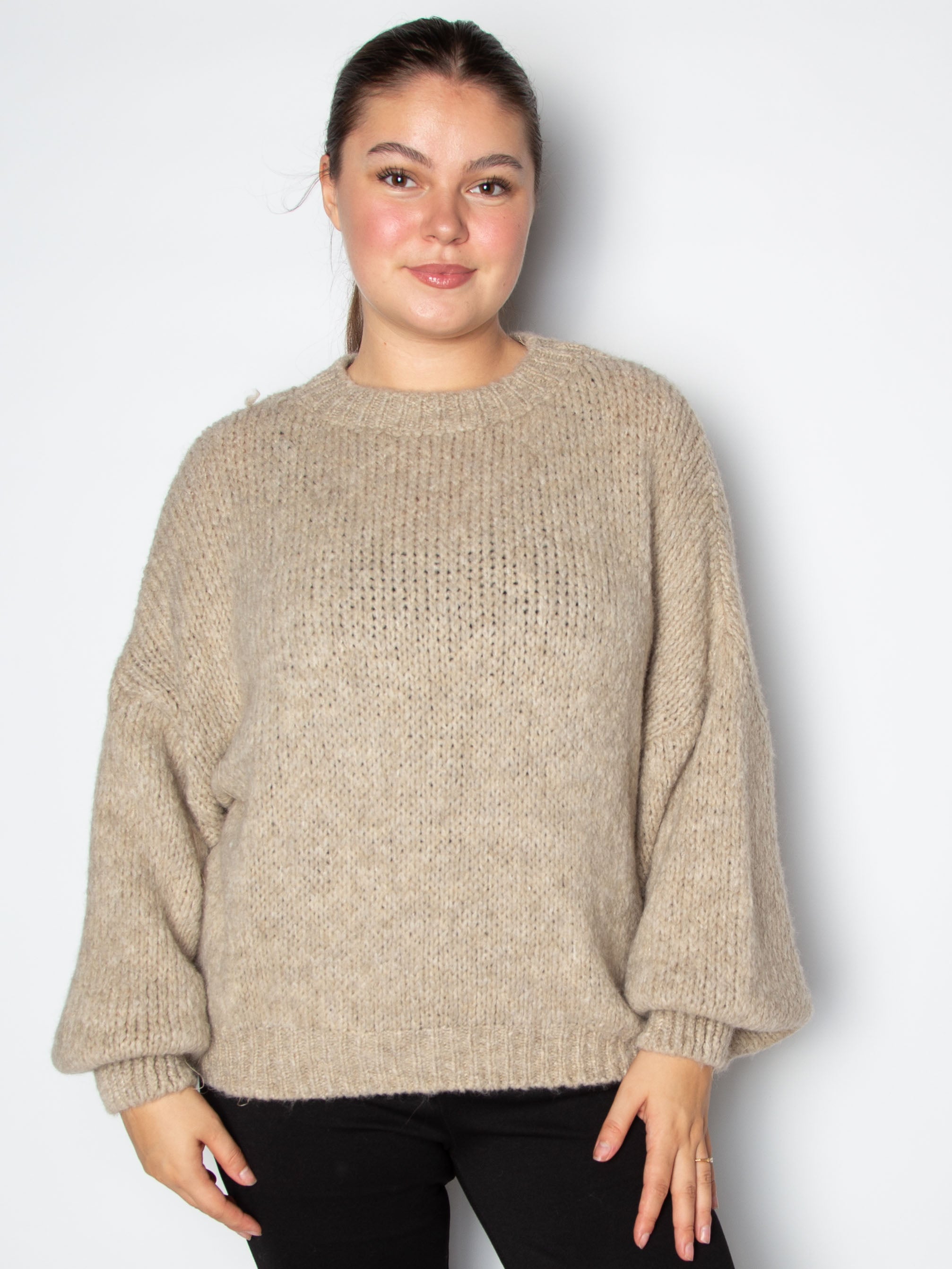Vamset striktrøje