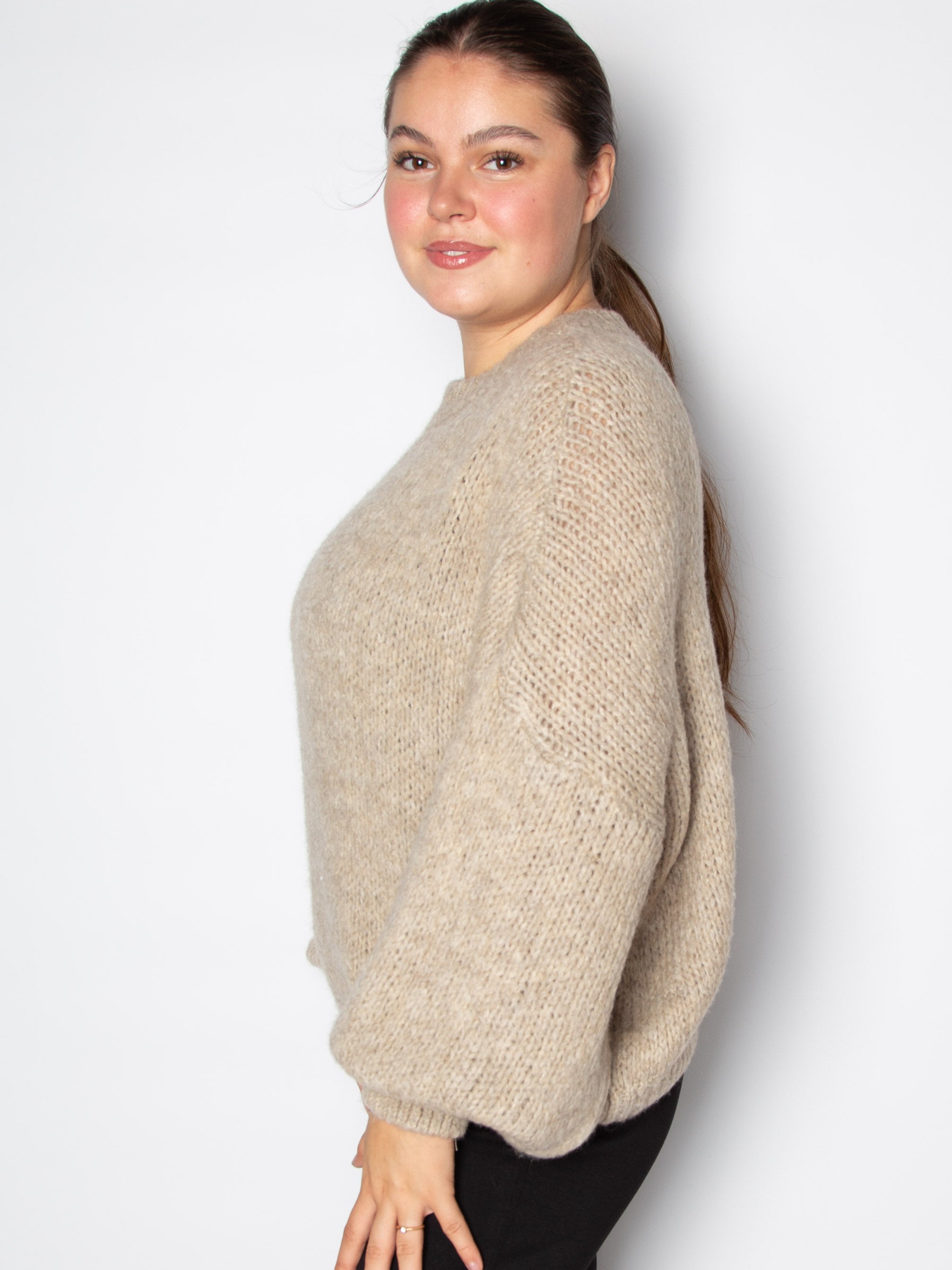 Vamset striktrøje