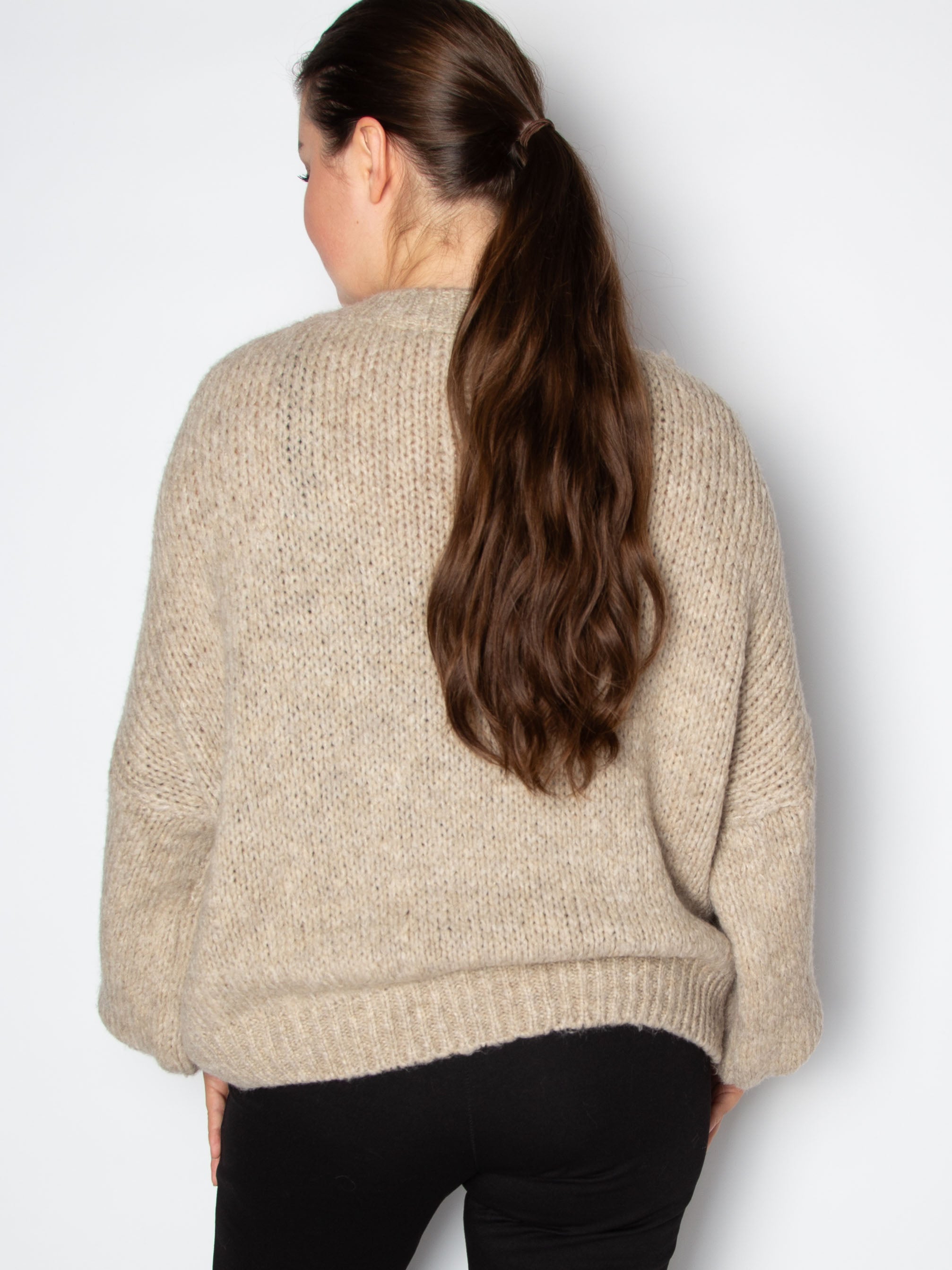 Vamset striktrøje