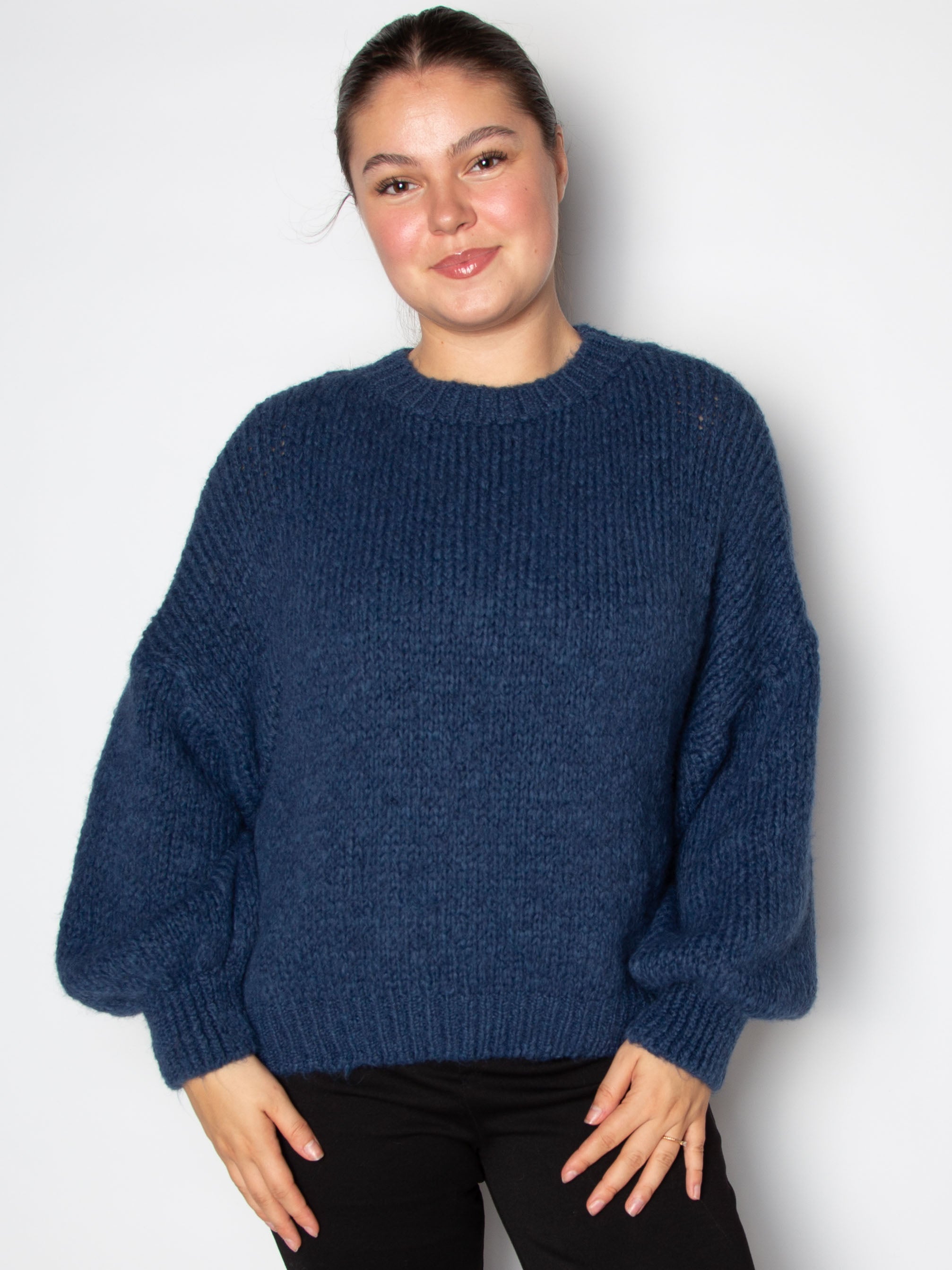 Vamset striktrøje