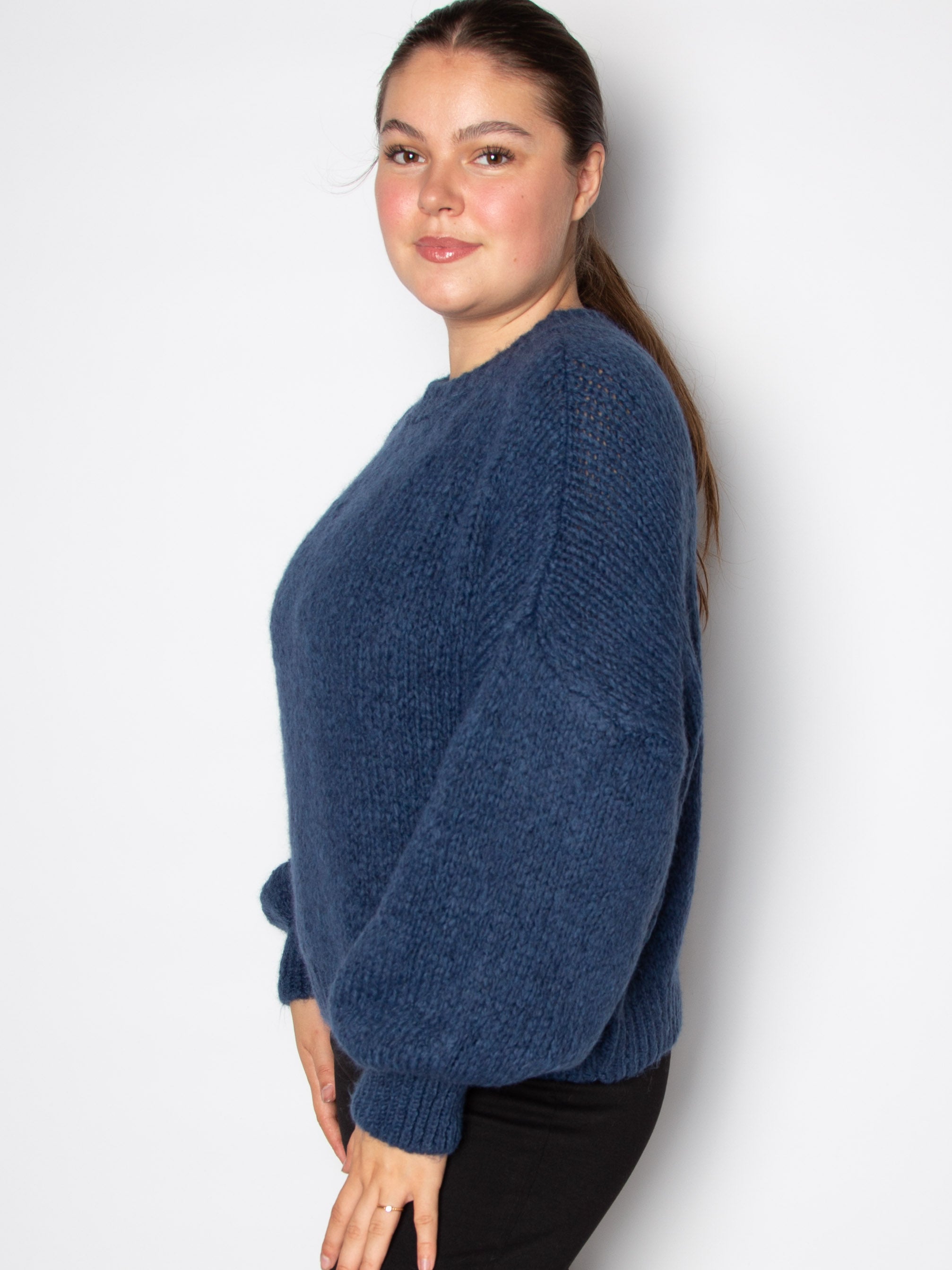 Vamset striktrøje