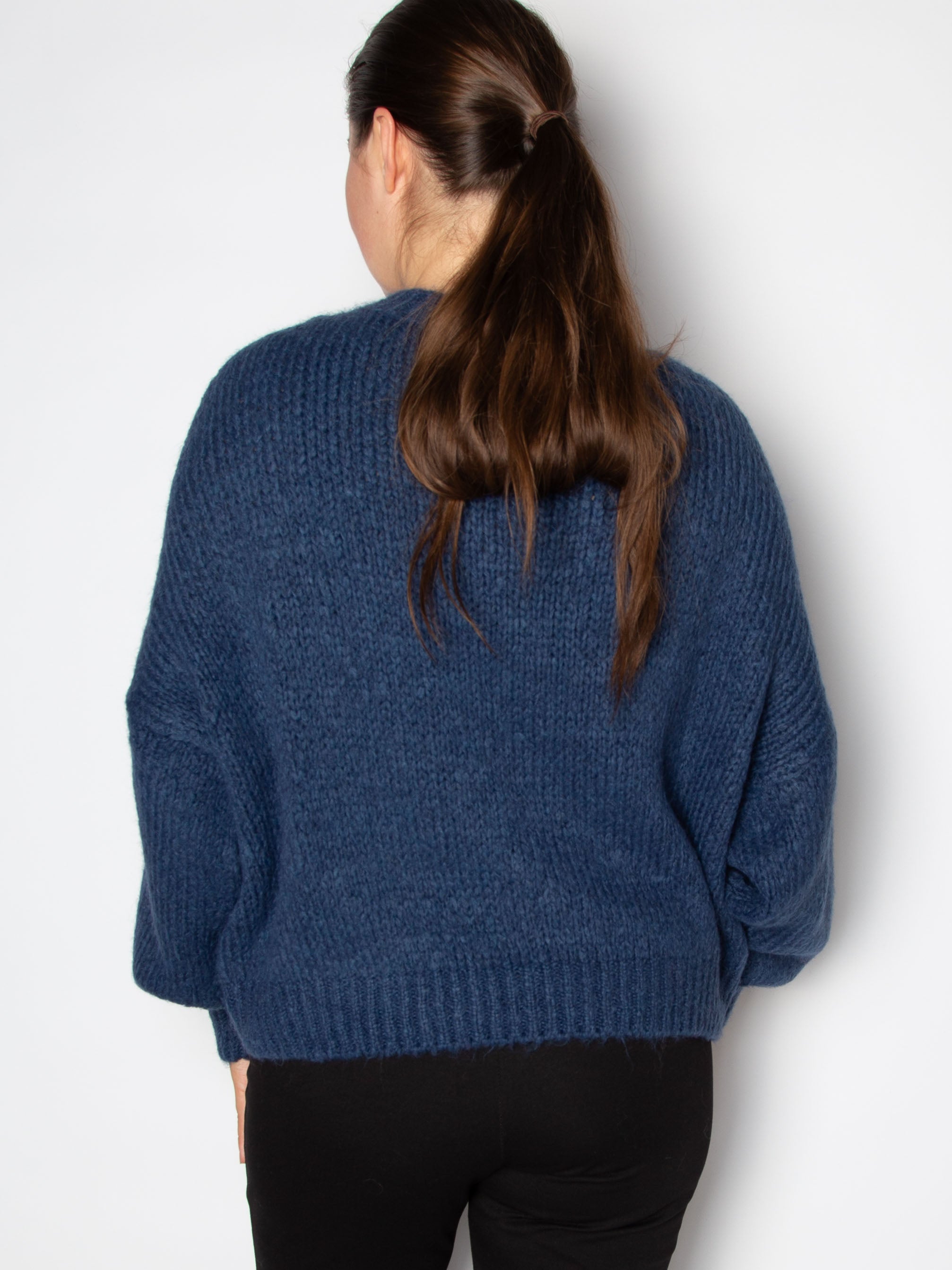 Vamset striktrøje