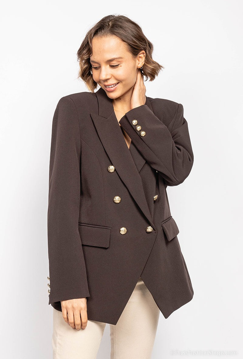 Blazer med guld knapper