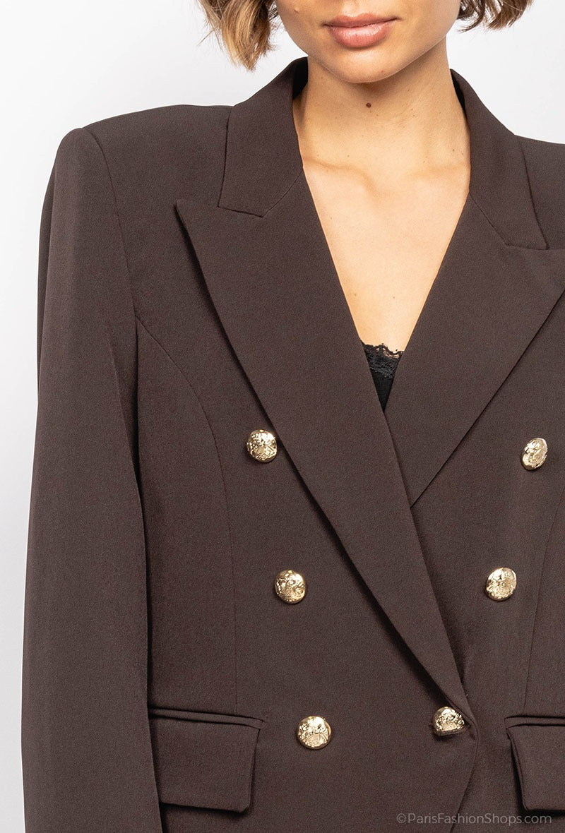 Blazer med guld knapper
