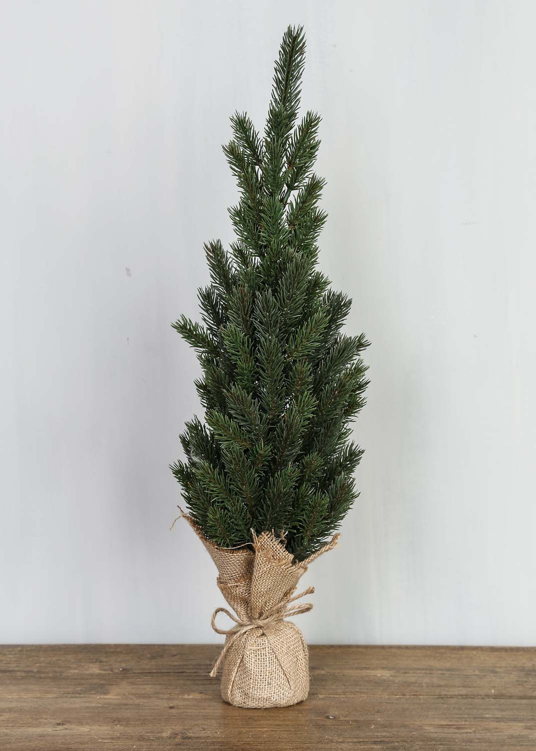 Fyrretræ med jutefod 56 cm