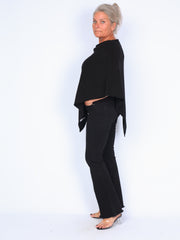 Klassisk strikket poncho