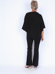 Klassisk strikket poncho