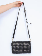 Braided leather bag with gold details