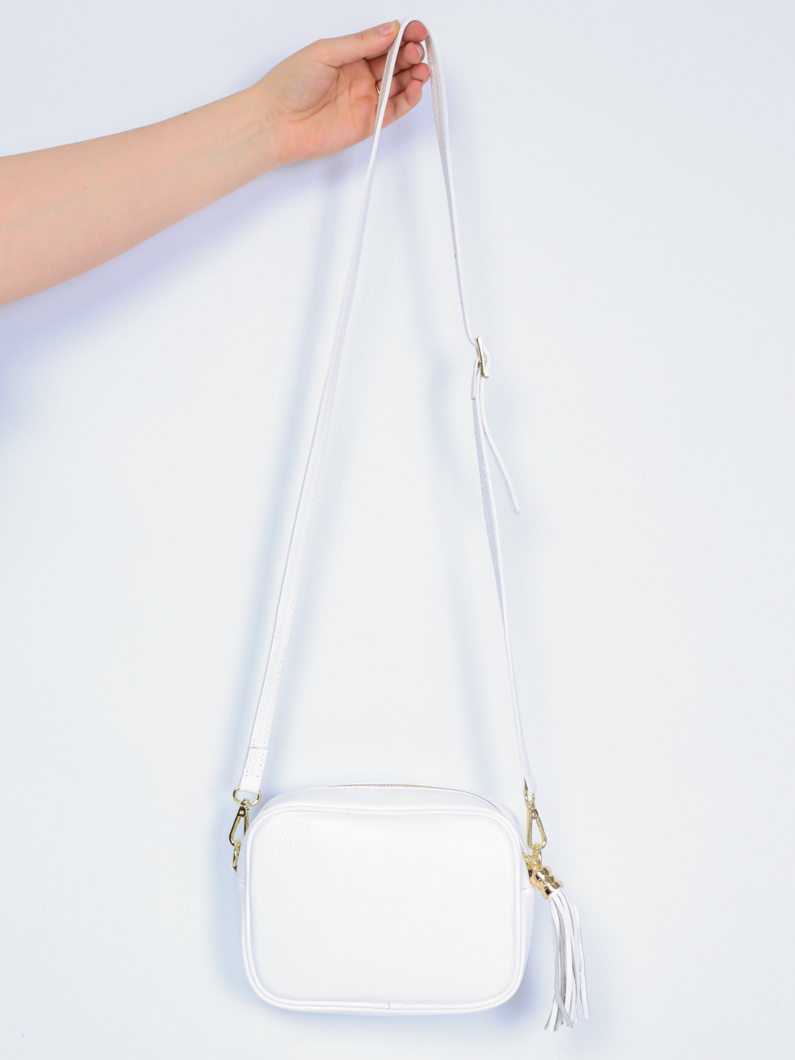 Leather bag with fringe pendant