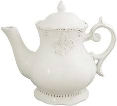 Teapot cream colored with lily